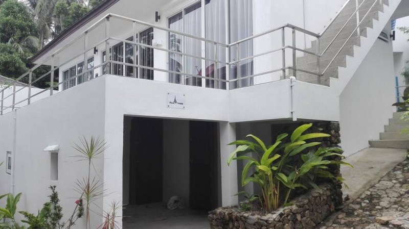 villa Paris - laundry room in the basement and access under the swimming pool. 800.